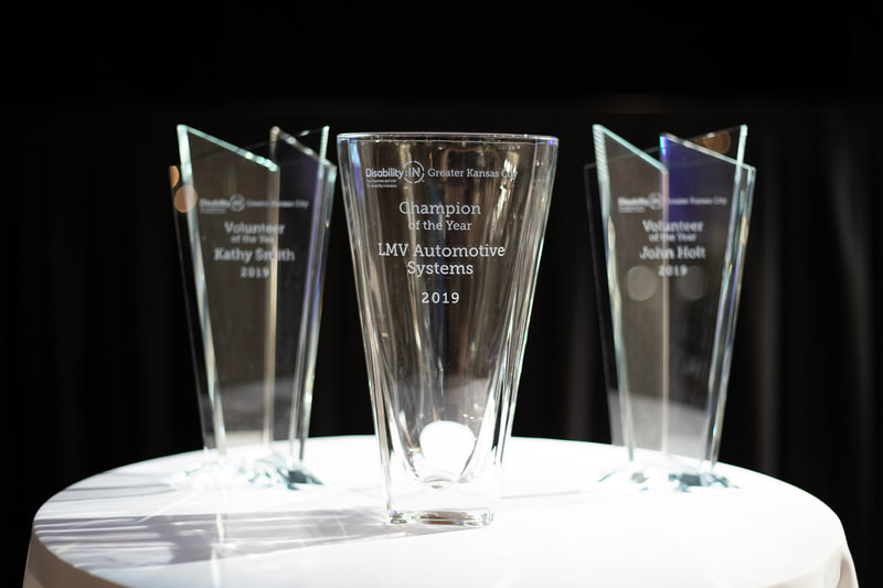 3 glass vases for award recipients