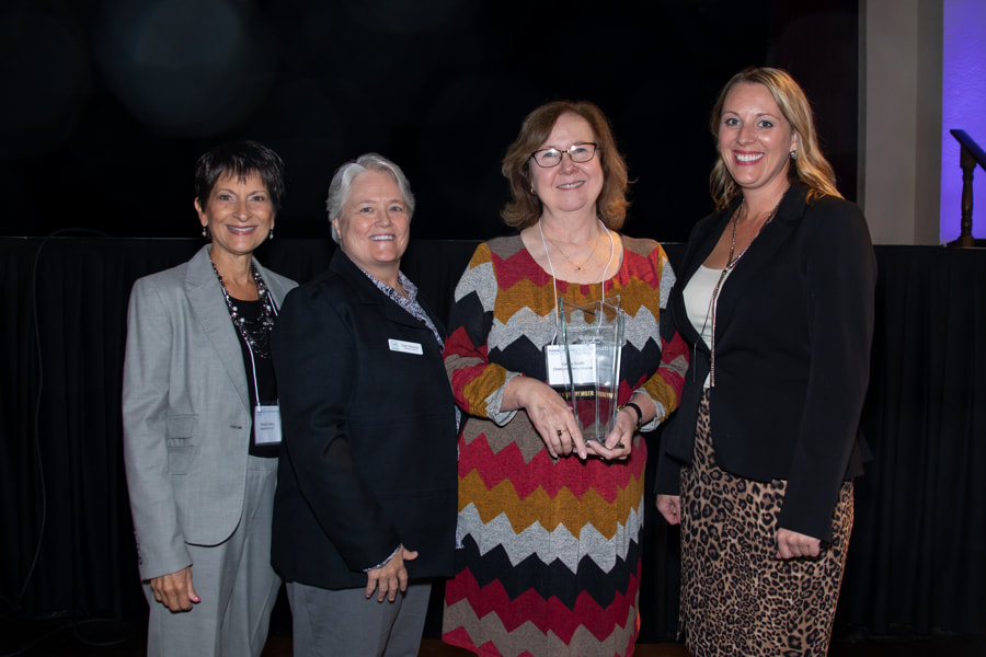 group pic with volunteer of the year award recipient Kathy Smith and Brenda Perkins, Darla Wilkerson, Mary Beth Majors